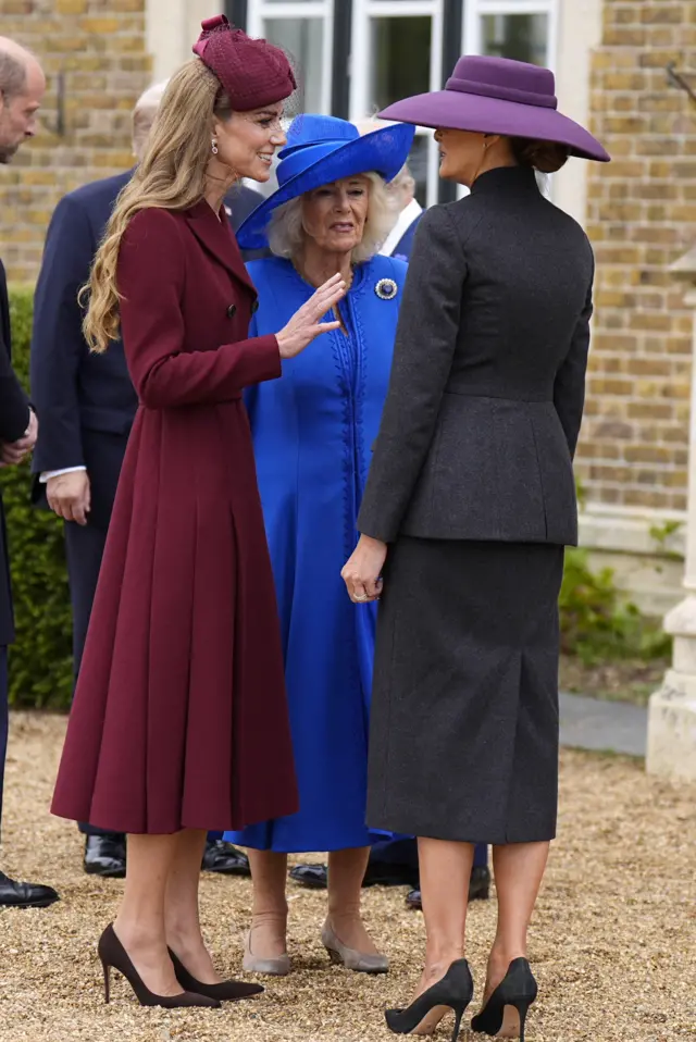The Princess of Wales, Queen Camilla and First Lady Melania Trump talk