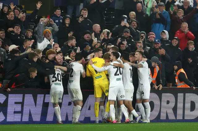 Swansea City players celebrate