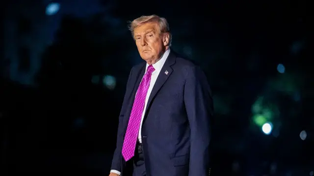 Donald Trump in a purple tie