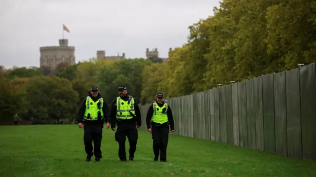 Police patrol fence near Windsor