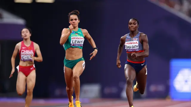 Australia's Torrie Lewis and Britain's Dina Asher-Smith in action during the heats