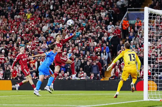 Liverpool's Hugo Ekitike (centre) attempts a header on goal