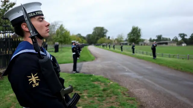 Members of the Royal Navy Ceremonial Guard line up the route ahead of a carriage procession through Windsor Castle