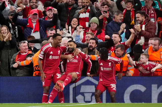 Mohamed Salah right winger of Liverpool and Egypt celebrates after scoring