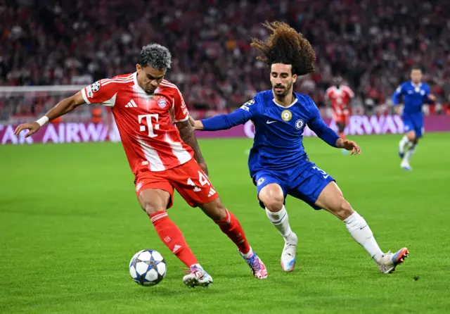 Chelsea's Marc Cucurella in action with Bayern Munich's Luis Diaz