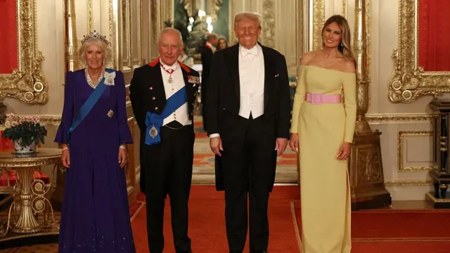 Queen Camilla, King Charles, President Trump and the First Lady stand side by side and smile for the photo