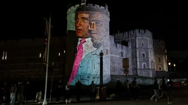 Images of Donald Trump and Jeffrey Epstein projected onto the side of Windsor Castle