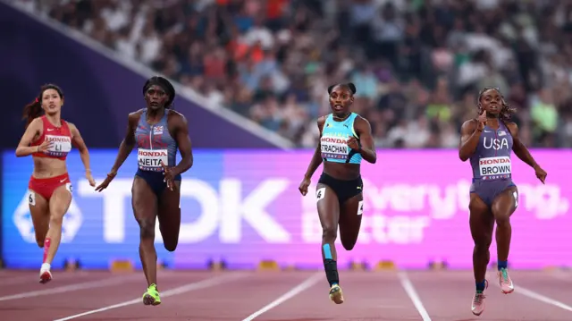 Brittany Brown of the U.S., Bahamas' Anthonique Strachan and Britain's Daryll Neita in action