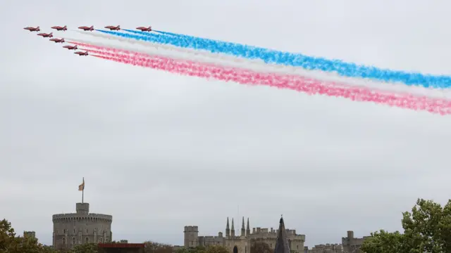 Red Arrows fly over Windsor Castle in Berkshire
