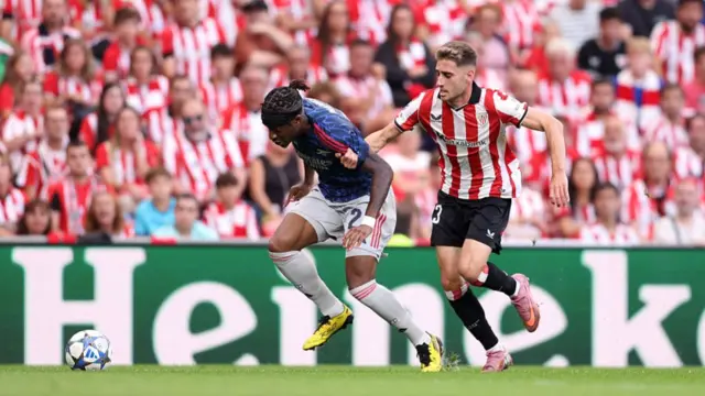 Noni Madueke in action against Athletic Club