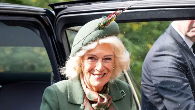 Queen Camilla smiles