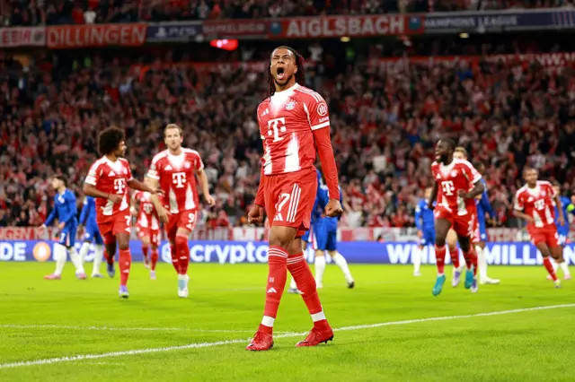 Michael Olise of Bayern Munich celebrates the team's first goal, scored from an own goal by Trevoh Chalobah of Chelsea (not pictured) during the UEFA Champions League 2025/26 League Phase MD1 match between FC Bayern München and Chelsea FC at Football Arena Munich on September 17, 2025 in Munich, Germany.