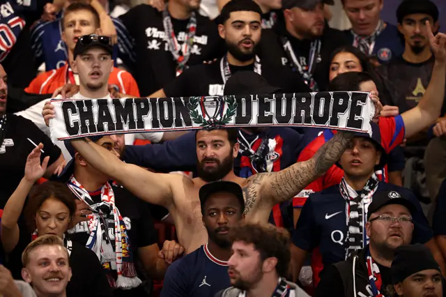 PSG's supporters cheer their team on from the stands ahead of the UEFA Champions League first round day 1 football match between Paris Saint-Germain (FRA) and Atalanta (ITA) at the Parc des Princes stadium in Paris on September 17, 2025.