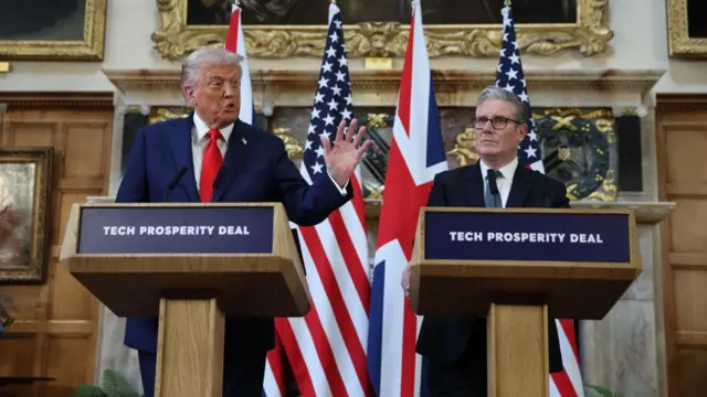 Trump gestures as he speaks during the joint news conference