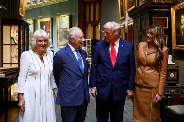 U.S. President Donald Trump and first lady Melania Trump stand next to Britain's King Charles and Queen Camilla as they bid their farewells while they depart Windsor Castle, in Windsor, Britain, September 18, 2025.