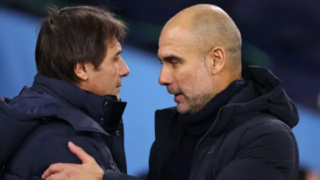 Conte and Guardiola embrace