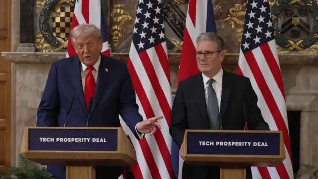 Trump points towards Starmer as he speaks at the joint news conference