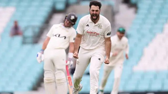 Brett Hutton celebrating a wicket for Notts at Surrey