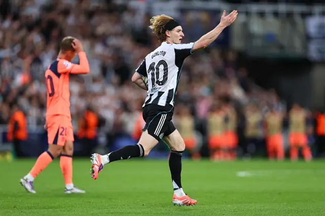 Anthony Gordon of Newcastle United celebrates after scoring a goal to make it 1-2 during the UEFA Champions League 2025/26 League Phase MD1 match between Newcastle United FC and FC Barcelona at St James' Park on September 18, 2025 in Newcastle upon Tyne, England.