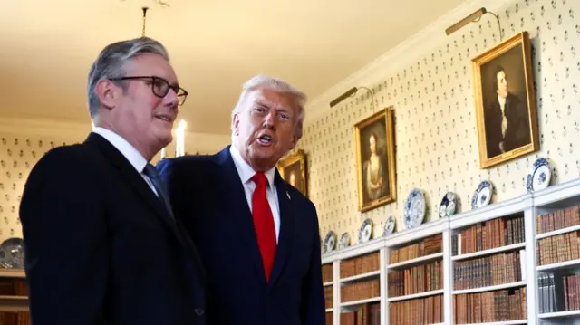 Keir Starmer stands with Donald Trump as they tour chequers
