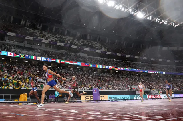 Sydney McLaughlin-Levrone of Team United States crosses the finish line