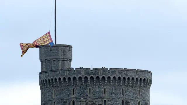 The Royal standard lowered from windsor castle.