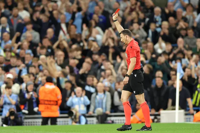 German referee Felix Zwayer gives a red card to Napoli's Italian defender #22 Giovanni Di Lorenzo