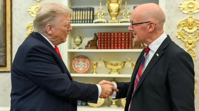 Donald Trump and John Swinney shake hands in the White House