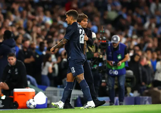 Giovanni Di Lorenzo of SSC Napoli leaves the pitch after receiving a red card during the UEFA Champions League 2025/26 League Phase MD1 match between Manchester City and SSC Napoli at City of Manchester Stadium on September 18, 2025 in Manchester, England.