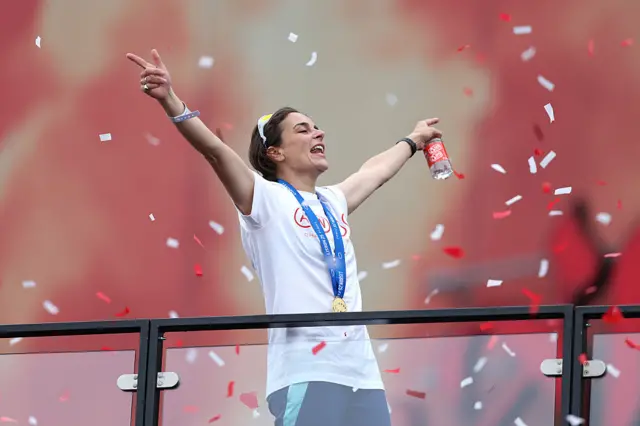 Renee Slegers celebrating with her arms out wide