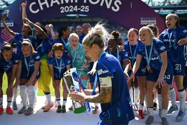 Millie Bright with WSL trophy