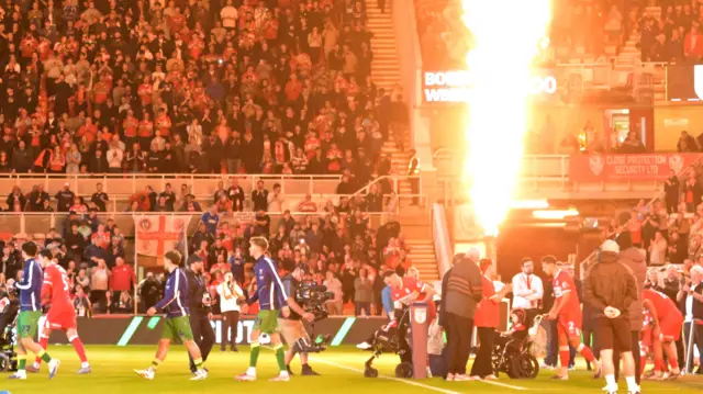 Players emerge to flames