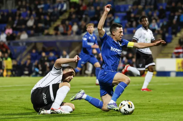 Dunfermline's Kyle Benedictus challenges Jason Holt