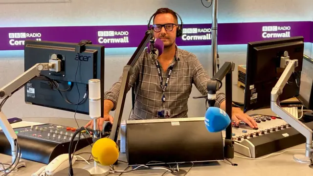 BBC Cornwall’s Neil Caddy pictured in a radio studio