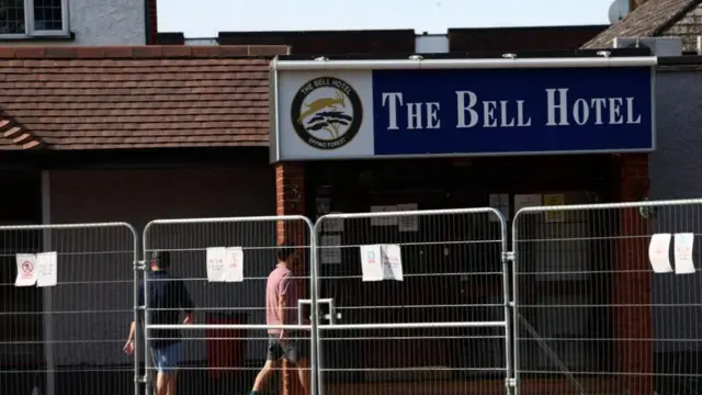 Fencing blocks off the entrance way to the Bell Hotel in Epping, whose name is written on a sign