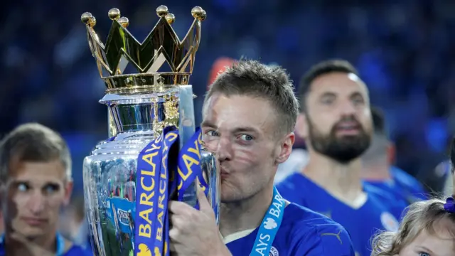 Jamie Vardy kisses the Premier League trophy