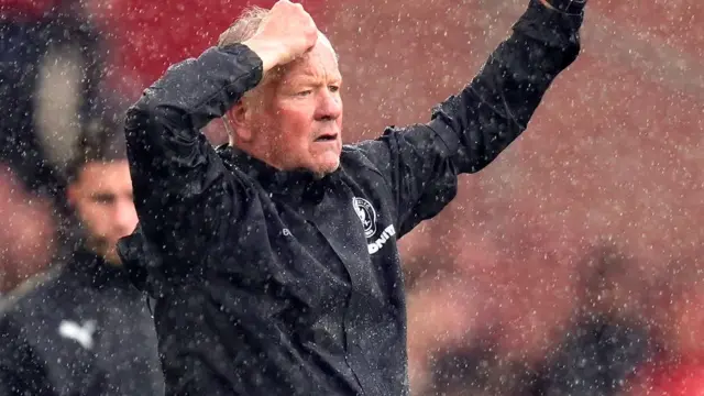 Chris Wilder in the rain