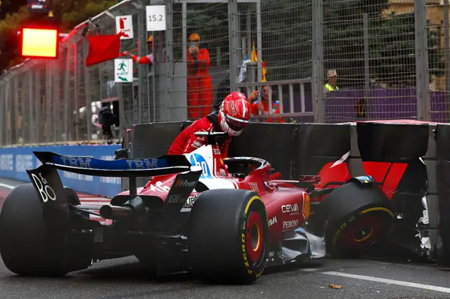 Charles Leclerc climbs out of his car after crashing in Baku qualifying