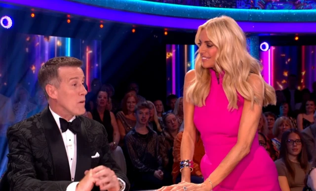 Anton Du Beke sitting next to Tess Daly
