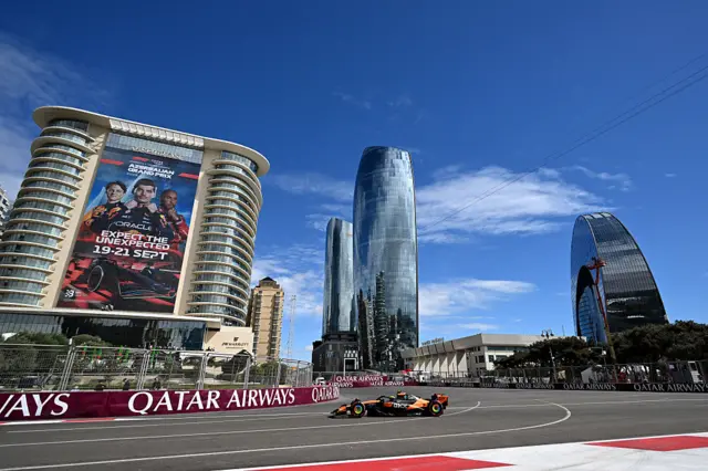 Lando Norris drives his McLaren on the Baku street circuit