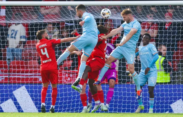 Stephen O'Donnell heads towards goal, before the ball was hooked off the line
