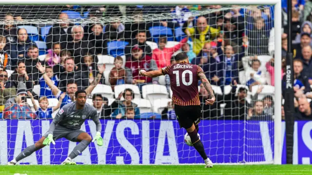Antoni Sarcevic scoring from the penalty spot against Cardiff