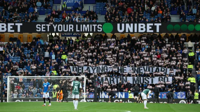 A banner calls for Russell Martin's sacking