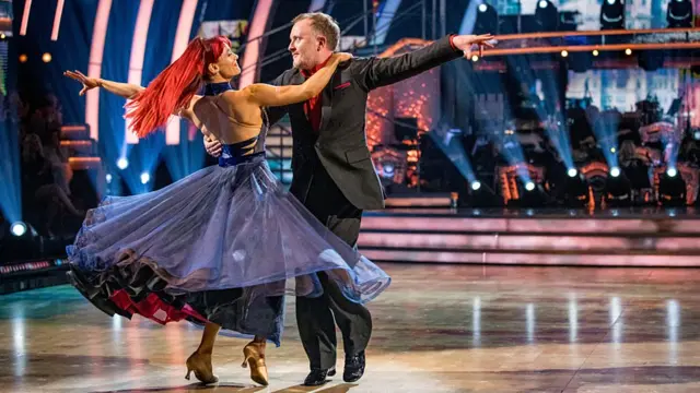 Chris and Dianne dancing facing each other on the Strictly dance floor