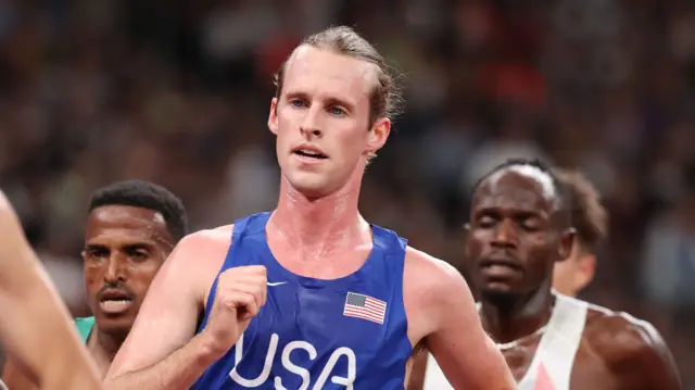 Cole Hocker running in the men's 5,000m heats