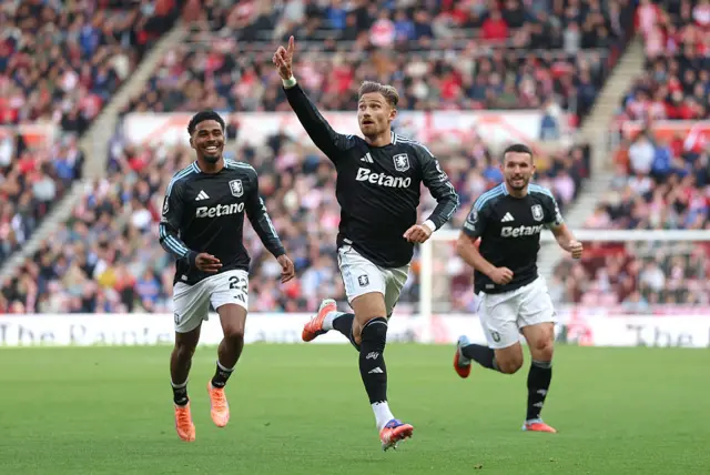 Matty Cash celebrates