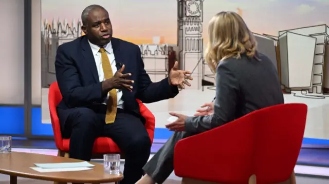 Deputy Prime Minister and Justice Secretary David Lammy and shadow chancellor Mel Stride talking together as they wait to appear on the BBC1 current affairs programme, Sunday with Laura Kuenssberg