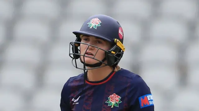 Gaby Lewis batting for Lancashire with her Red Rose helmet on