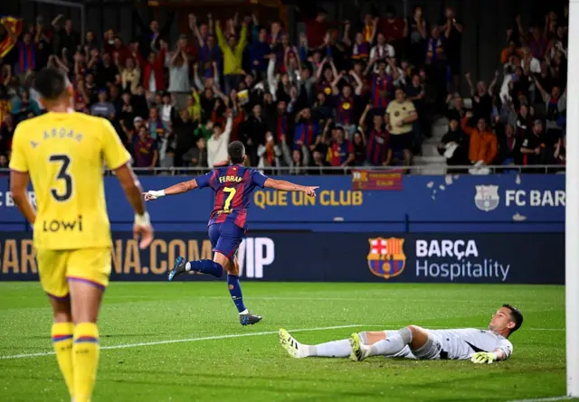 Torres runs to celebrate his goal as Getafe players lie on the floor