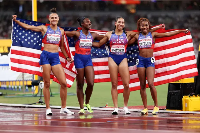 Team United States celebrate winning gold in the Women's 4x400 Metres Relay Final.
